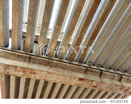 SELANGOR, MALAYSIA -JULY 6, 2022: An elevated road is under construction. Reinforced concrete is used for the structure. Construction is done in stages according to the sequence of works. SELANGOR, MALAYSIA -JULY 6, 2022: An elevated road is under construction. Reinforced concrete is used for the structure. Construction is done in stages according to the sequence of works. 97193744
