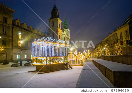 Warsaw, Poland. Christmas decoration   ( illuminated city)  of downtown of Warsaw "Old tram with horses"  as Christmas 97194619