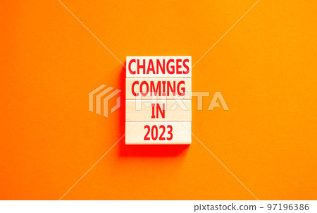 Changes coming in 2023 symbol. Concept word Changes coming in 2023 on wooden blocks. Beautiful orange table orange background. Business and changes coming in 2023 concept. Copy space. Changes coming in 2023 symbol. Concept word Changes coming in 2023 on wooden blocks. Beautiful orange table orange background. Business and changes coming in 2023 concept. Copy space. 97196386