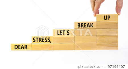 Stress break up symbol. Concept words Dear stress let is break up on wooden blocks. Businessman hand. Beautiful white table white background. Business motivational stress break up concept. Copy space. 97196407