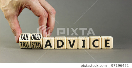Tailored or trusted advice symbol. Concept words Tailored advice and Trusted advice on wooden cubes. Businessman hand. Beautiful grey background. Business tailored trusted advice concept. Copy space. Tailored or trusted advice symbol. Concept words Tailored advice and Trusted advice on wooden cubes. Businessman hand. Beautiful grey background. Business tailored trusted advice concept. Copy space. 97196451