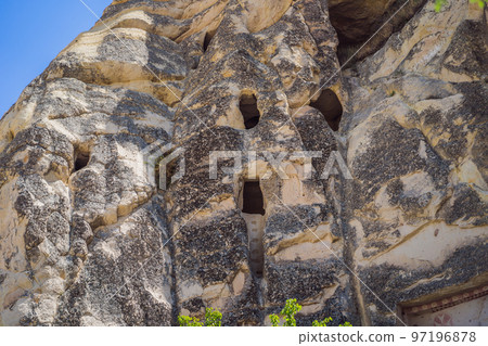 Beautiful stunning view of the mountains of Cappadocia and cave houses. Turkey Beautiful stunning view of the mountains of Cappadocia and cave houses. Turkey 97196878