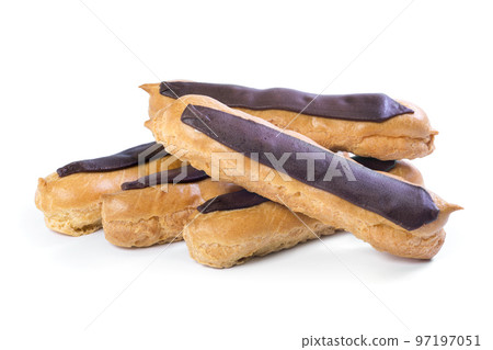 Fresh French eclairs with custard inside on a white background. Dessert 97197051