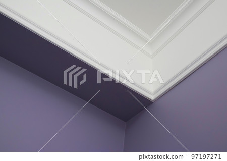 Ceiling moldings in the interior, detail of a angular ceiling skirting Ceiling moldings in the interior, detail of a angular ceiling skirting 97197271