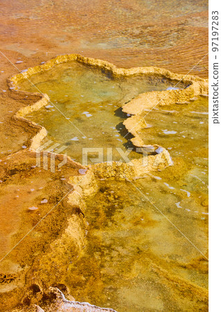 Yellowstone hot spring up close to terraces looking down 97197283