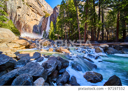 Yosemite National Park Lower Falls in early spring with frosty aqua river Yosemite National Park Lower Falls in early spring with frosty aqua river 97197332