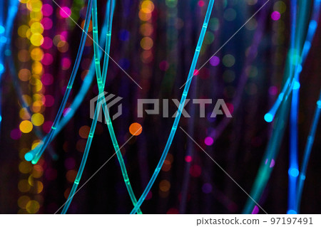 Strings of glowing neon lights in all colors Strings of glowing neon lights in all colors 97197491