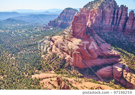 Landscape aerial of large red rock mountains in desert Landscape aerial of large red rock mountains in desert 97198259