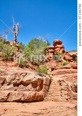 Detail steps in red rock desert hiking 97198790