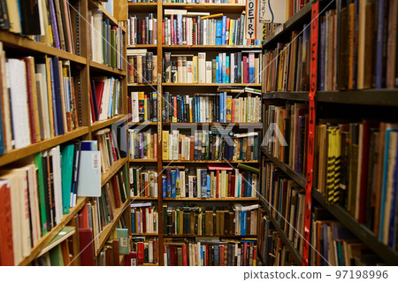 Library bookstore dead end with shelves covered in books Library bookstore dead end with shelves covered in books 97198996