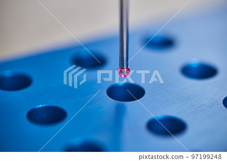 Blue test block with CMM Programming probe featuring purple tip 97199248