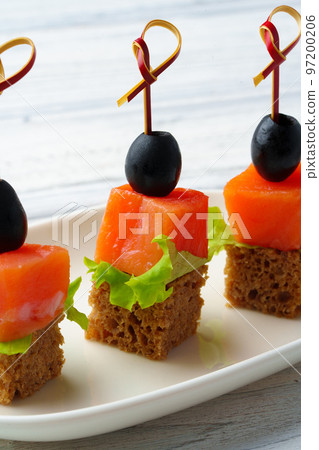 Catering banquet table food snacks with fish 97200206