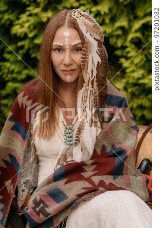 Beautiful young bride in a boho dress. 97201082