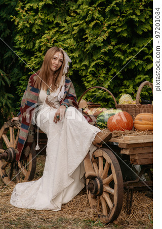 Beautiful young bride in a boho dress. Beautiful young bride in a boho dress. 97201084
