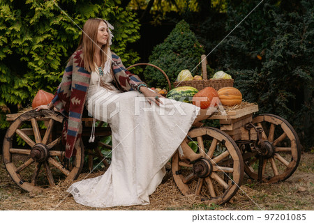 Beautiful young bride in a boho dress. Beautiful young bride in a boho dress. 97201085