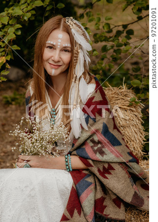 Beautiful young bride in a boho dress. 97201091