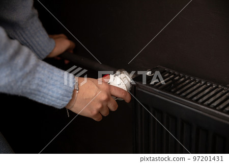 Regulation of radiators with a thermostatic head. Central heating in the house. Regulation of radiators with a thermostatic head. Central heating in the house. 97201431