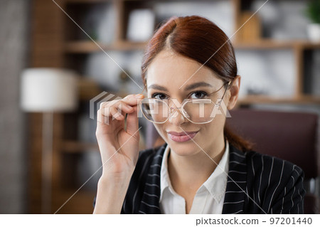 Good looking confident woman team leader in modern company office. 97201440