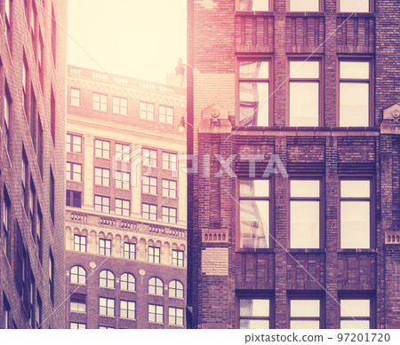 New York old buildings facades, color toning applied, USA. New York old buildings facades, color toning applied, USA. 97201720