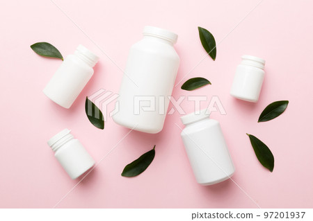 supplement pills with medicine bottle health care and medical top view. Vitamin tablets. Top view mockup bottle for pills and vitamins with green leaves, natural organic bio supplement, copy space supplement pills with medicine bottle health care and medical top view. Vitamin tablets. Top view mockup bottle for pills and vitamins with green leaves, natural organic bio supplement, copy space 97201937