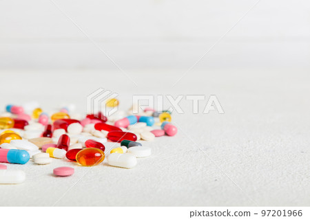 Many different colorful medication and pills perspective view. Set of many pills on colored background 97201966