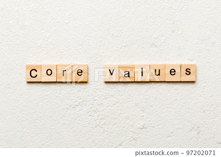 CORE VALUES word written on wood block. CORE VALUES text on cement table for your desing, concept CORE VALUES word written on wood block. CORE VALUES text on cement table for your desing, concept 97202071