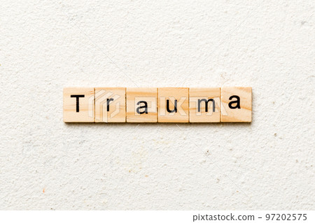 trauma word written on wood block. trauma text on table, concept 97202575