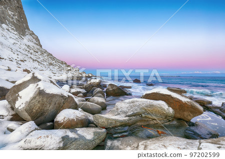 Gorgeous winter scenery on Uttakleiv beach at morning 97202599