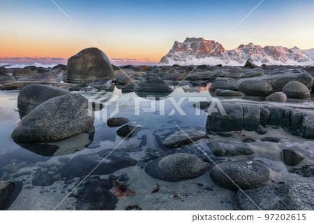 Breathtaking winter scenery on Uttakleiv beach at morning Breathtaking winter scenery on Uttakleiv beach at morning 97202615