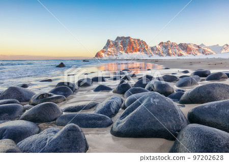 Gorgeous winter scenery on Uttakleiv beach at morning 97202628