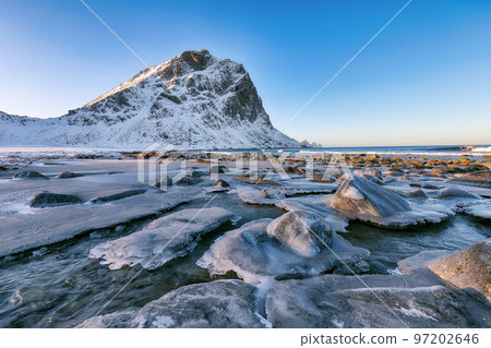 Gorgeous winter scenery on Uttakleiv beach at morning 97202646