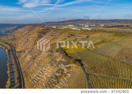 Aerial view Famous German Wine Region Moselle River Lay and Guels village Autumn Fall colors Aerial view Famous German Wine Region Moselle River Lay and Guels village Autumn Fall colors 97202803