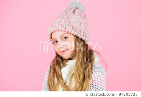 Child long hair warm soft woolen hat enjoy softness. Kid girl wear knitted soft hat pink background. Keep knitwear soft after washing. Soft knitted accessory. Tips for caring for knitted garments 97203723