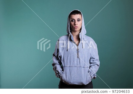 Portrait of unhappy upset woman looking nervous at camera while posing over isolated background in studio, having scary expression. Upset nervous female making disappointment grimacing Portrait of unhappy upset woman looking nervous at camera while posing over isolated background in studio, having scary expression. Upset nervous female making disappointment grimacing 97204633