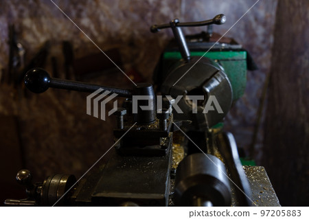 Close-up, metal engraving tools, watchmaker engraver work desk, selective focus Close-up, metal engraving tools, watchmaker engraver work desk, selective focus 97205883