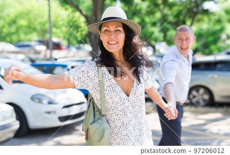Woman inviting her husband to go somewhere 97206012
