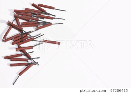 Happy Diwali. Pile of red firecrackers isolated on white background. Happy Diwali. Pile of red firecrackers isolated on white background. 97206415