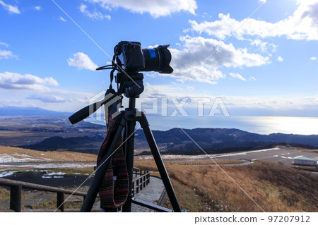 A camera that shoots the scenery, mountains, blue sky A camera that shoots the scenery, mountains, blue sky 97207912