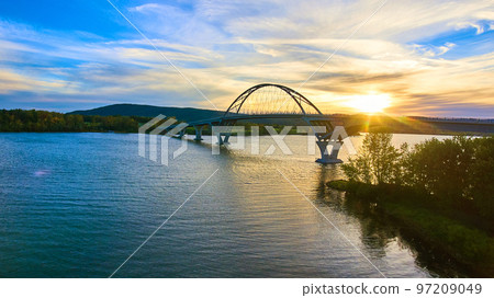 Bridge at sunset with blue skies over water connecting New York to Vermont Bridge at sunset with blue skies over water connecting New York to Vermont 97209049