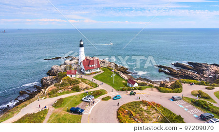Aerial over stunning Portland Head Light lighthouse on Maine coastline Aerial over stunning Portland Head Light lighthouse on Maine coastline 97209070