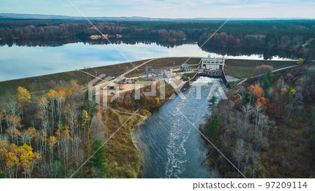 Michigan lake meet river at dam in late fall 97209114