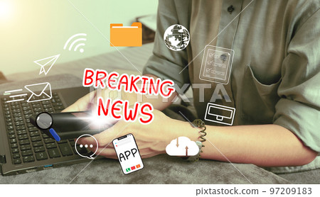 Online breaking news concept. hand holding smartphone using to watch around the globe news and daily updates on web page screens. Online breaking news concept. hand holding smartphone using to watch around the globe news and daily updates on web page screens. 97209183