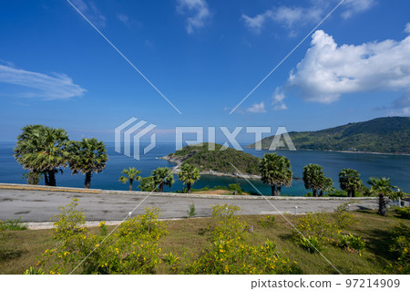 Promthep Cape is one of the most photographed locations in Phuket. Phromthep cape viewpoint at blue sea sky in Phuket, Thailand. 97214909