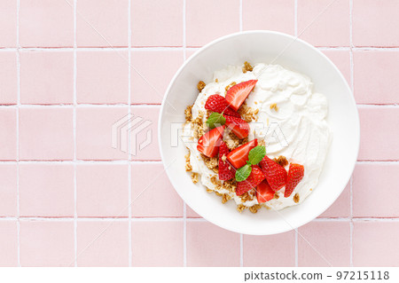 Yogurt with strawberry. Plain white greek yogurt with fresh berries and granola. Healthy food, breakfast. Top view 97215118