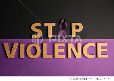 Purple ribbon and phrase STOP VIOLENCE on color background, flat lay 97215958