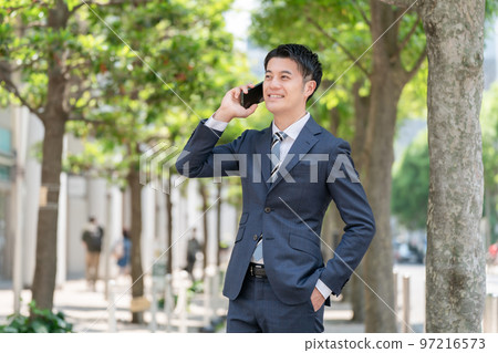 Smartphone male phone call fresh green 97216573