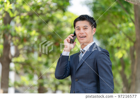 Smartphone male phone call fresh green 97216577