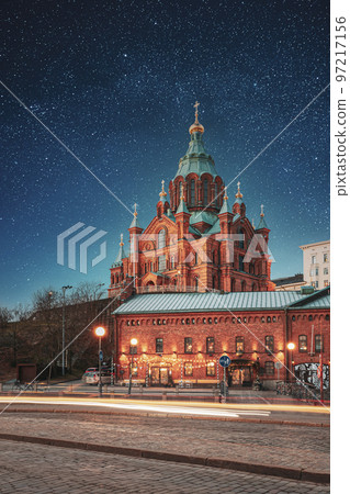 Helsinki, Finland. Bright Light Blue Dramatic Sky With Shining Stars. Uspenski Cathedral In Evening Illuminations Lights. Eastern Orthodox Of Theotokos - Virgin Mary. Azure Color Sky 97217156