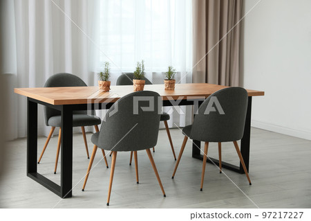 Modern room interior with chairs and table Modern room interior with chairs and table 97217227