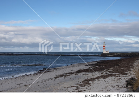 Old Gardur lighthouse and Atlantic Ocean, Iceland Old Gardur lighthouse and Atlantic Ocean, Iceland 97218665